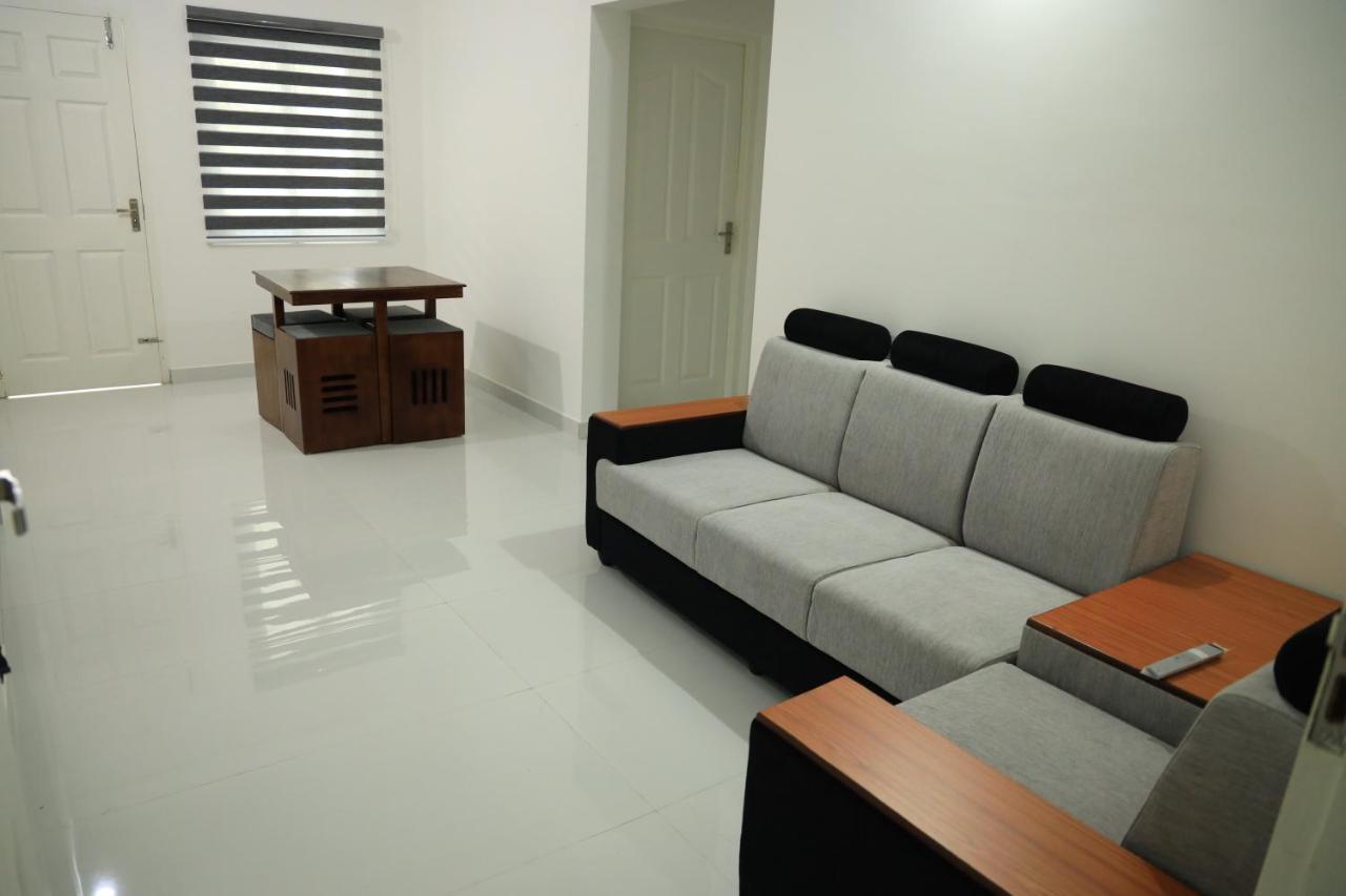 Yelza Hotel And Residence Alwaye Buitenkant foto
