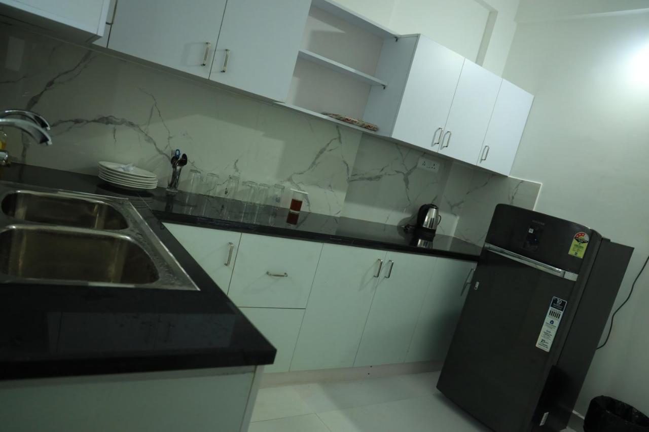 Yelza Hotel And Residence Alwaye Buitenkant foto