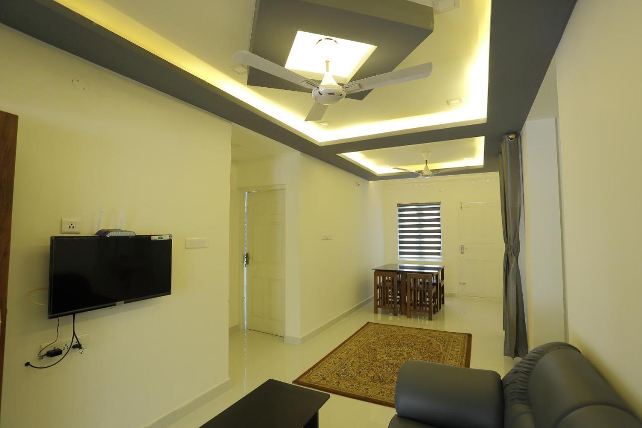Yelza Hotel And Residence Alwaye Buitenkant foto