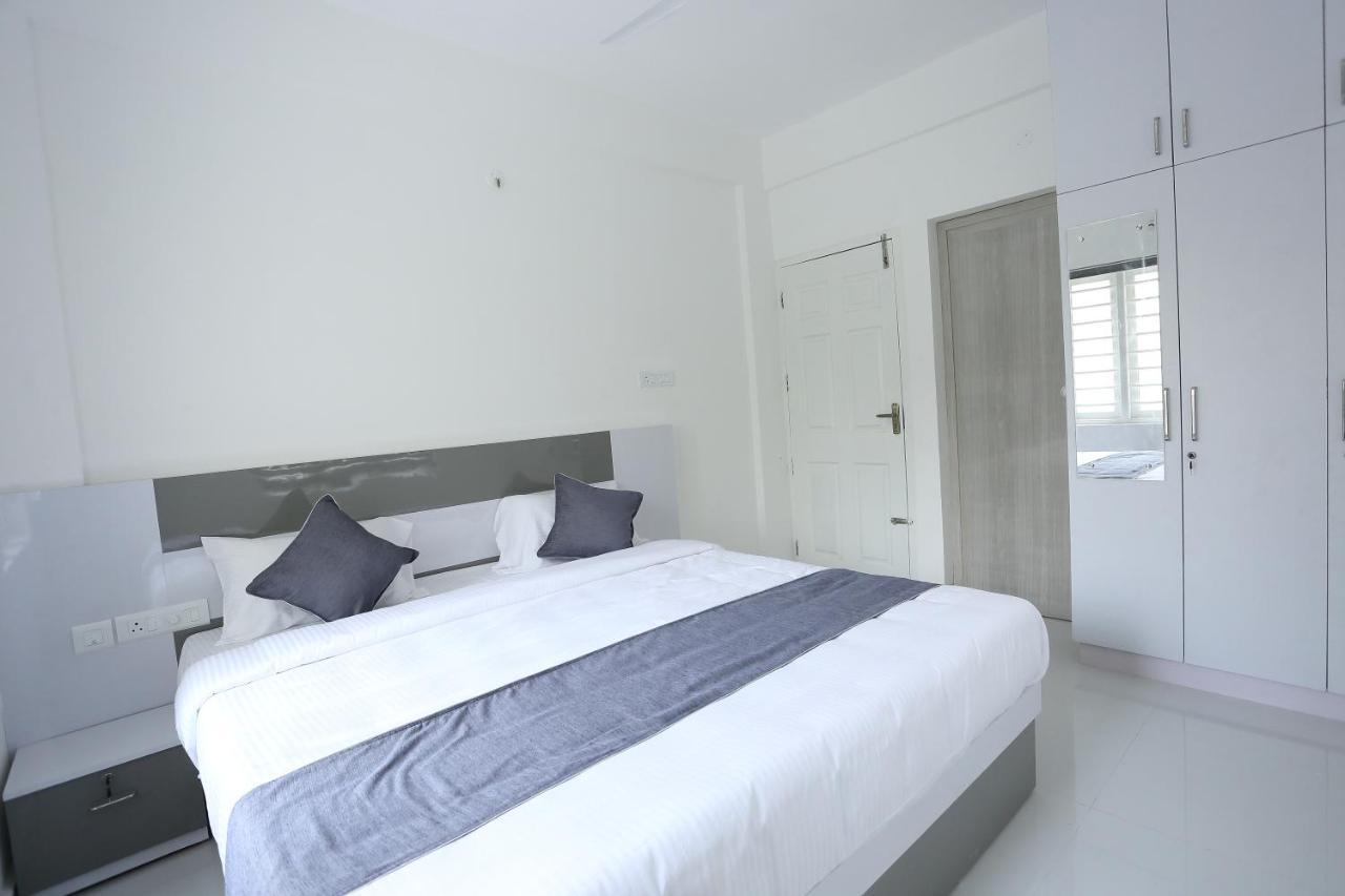 Yelza Hotel And Residence Alwaye Buitenkant foto