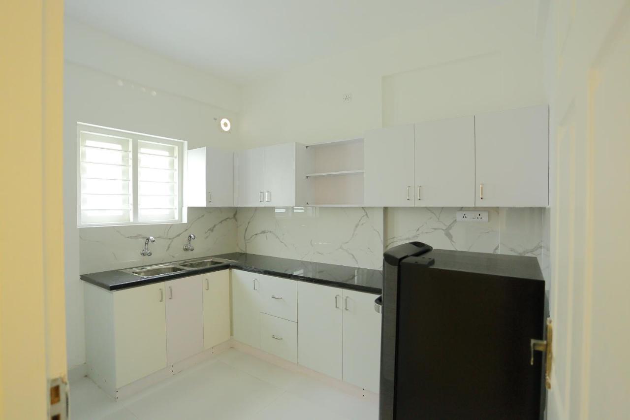 Yelza Hotel And Residence Alwaye Buitenkant foto