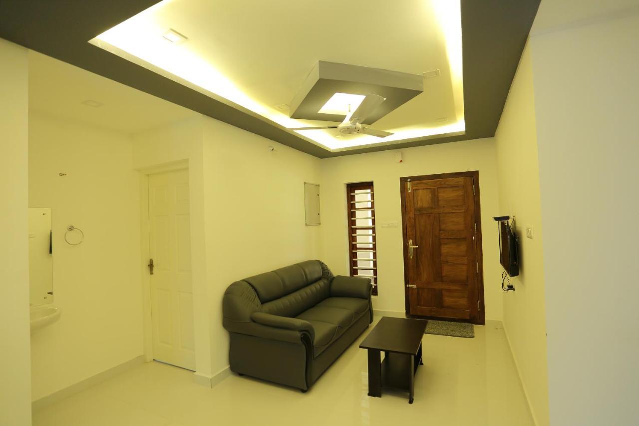 Yelza Hotel And Residence Alwaye Buitenkant foto